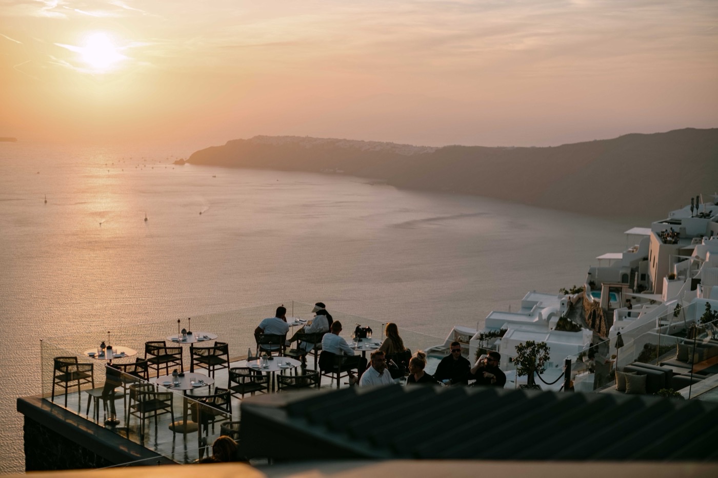 Golden hour sunset over the caldera, Santorini Greece – destination wedding photography Saphir Weddings